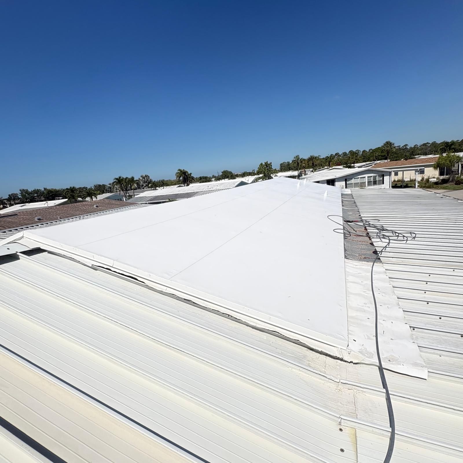 Metal roof after pressure washing — SW Florida