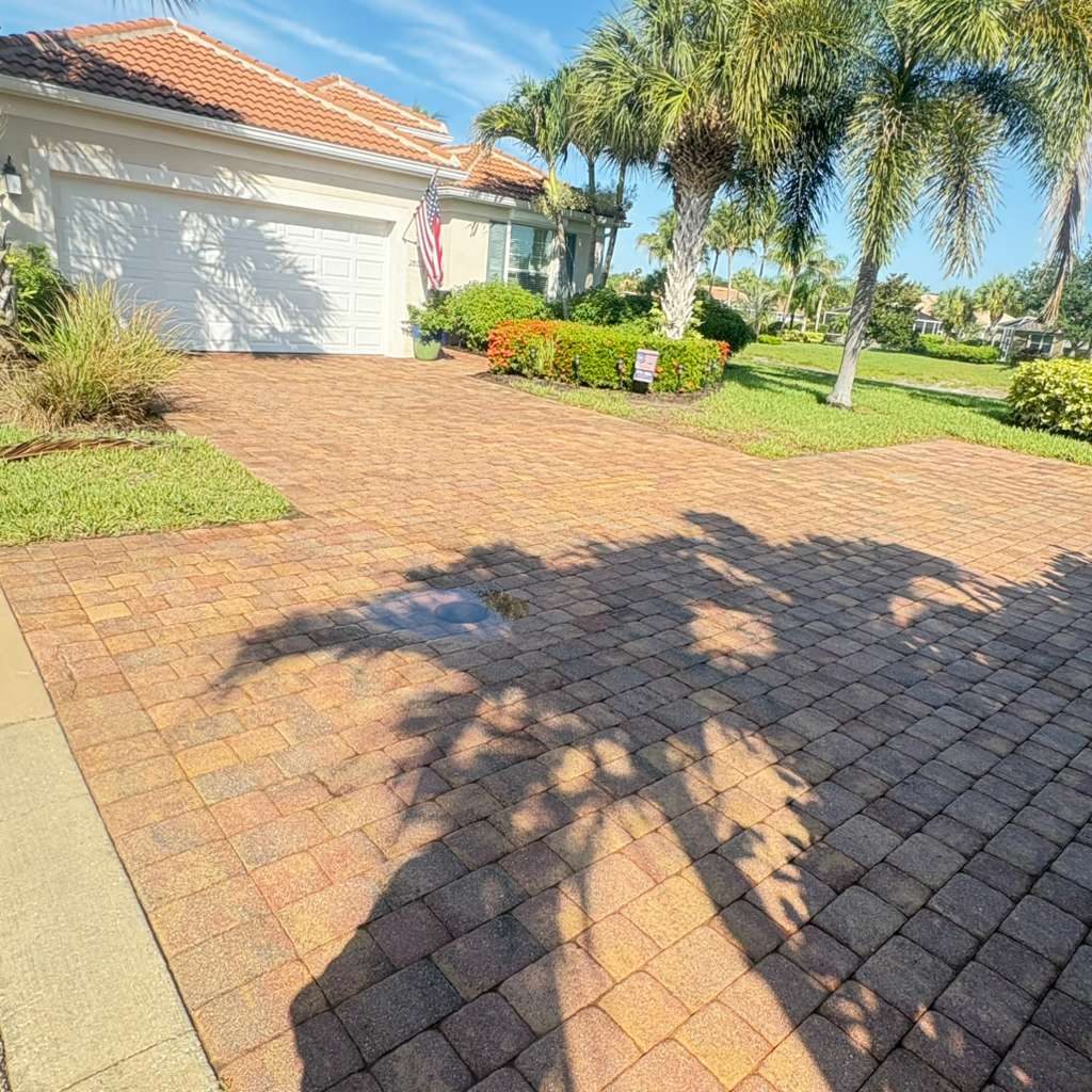 Clean paver driveway after pressure washing — Naples FL