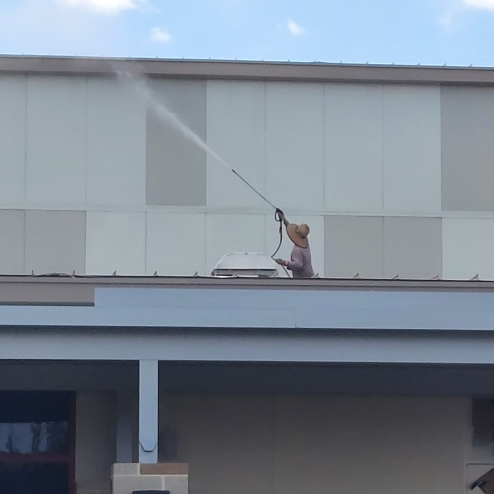 Blastmasters crew cleaning tile roof — SW Florida since 1998